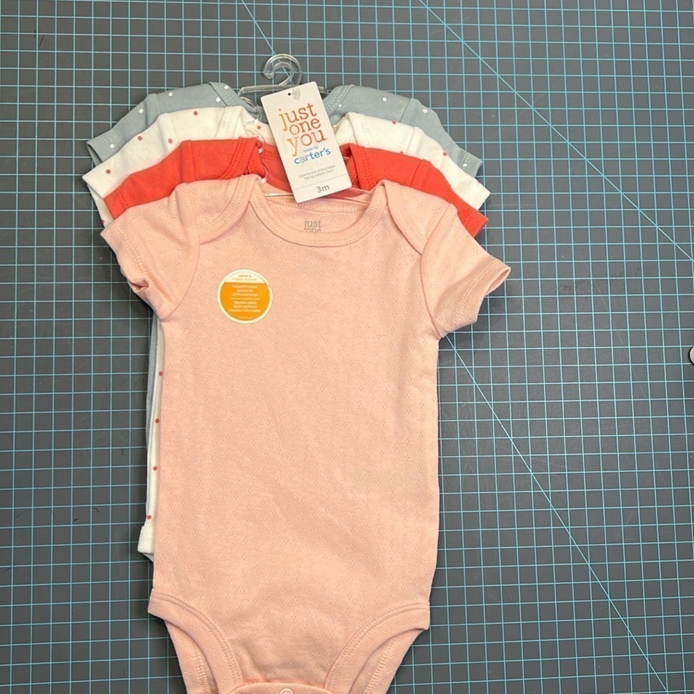Carters girls set of 4 short sleeve onesies size 3 months. New with tags.